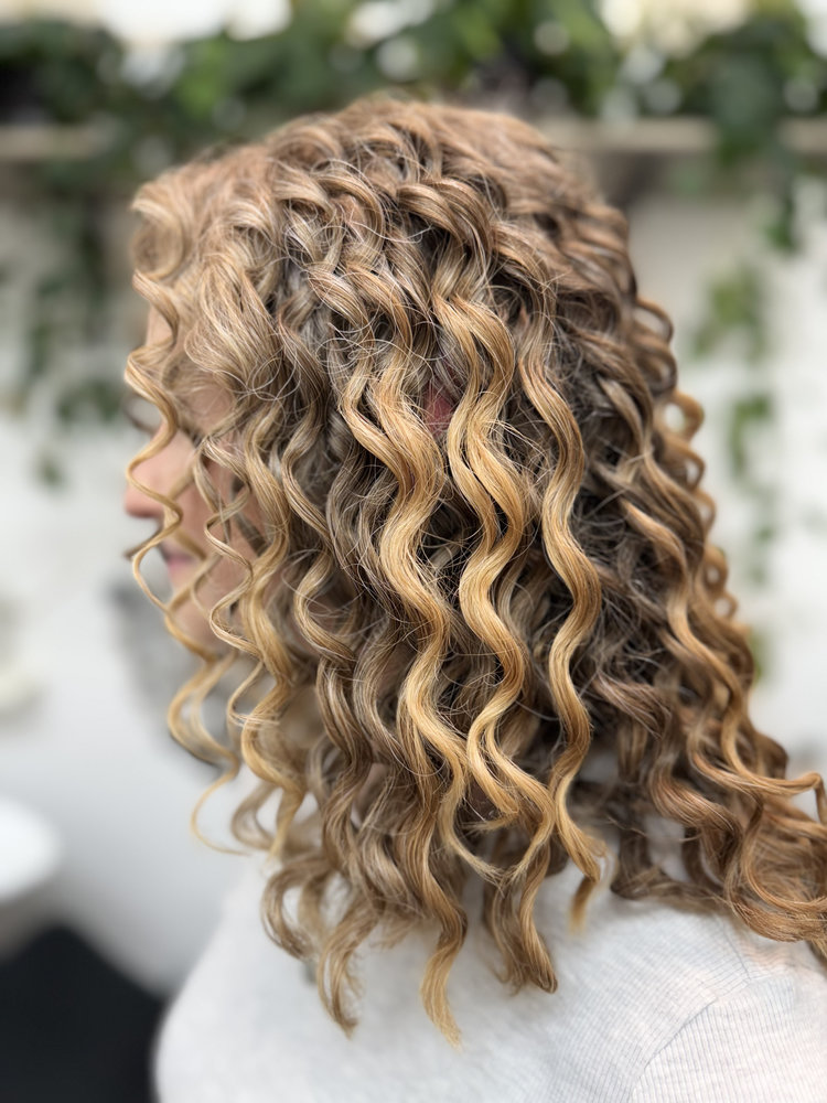 Curly blonde dimensional hair by Sonias