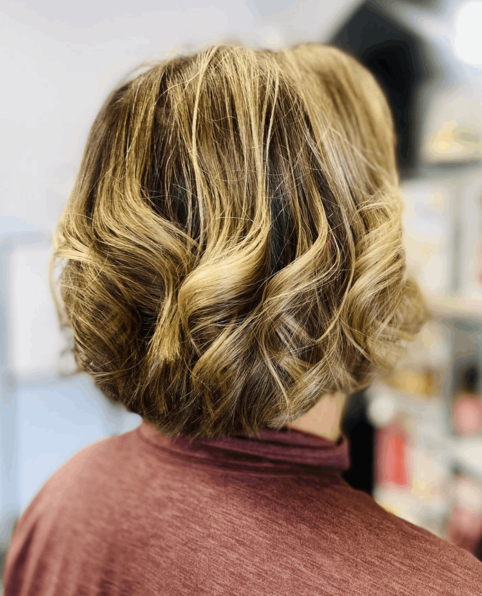 Short dimensional blonde bob by Sonias