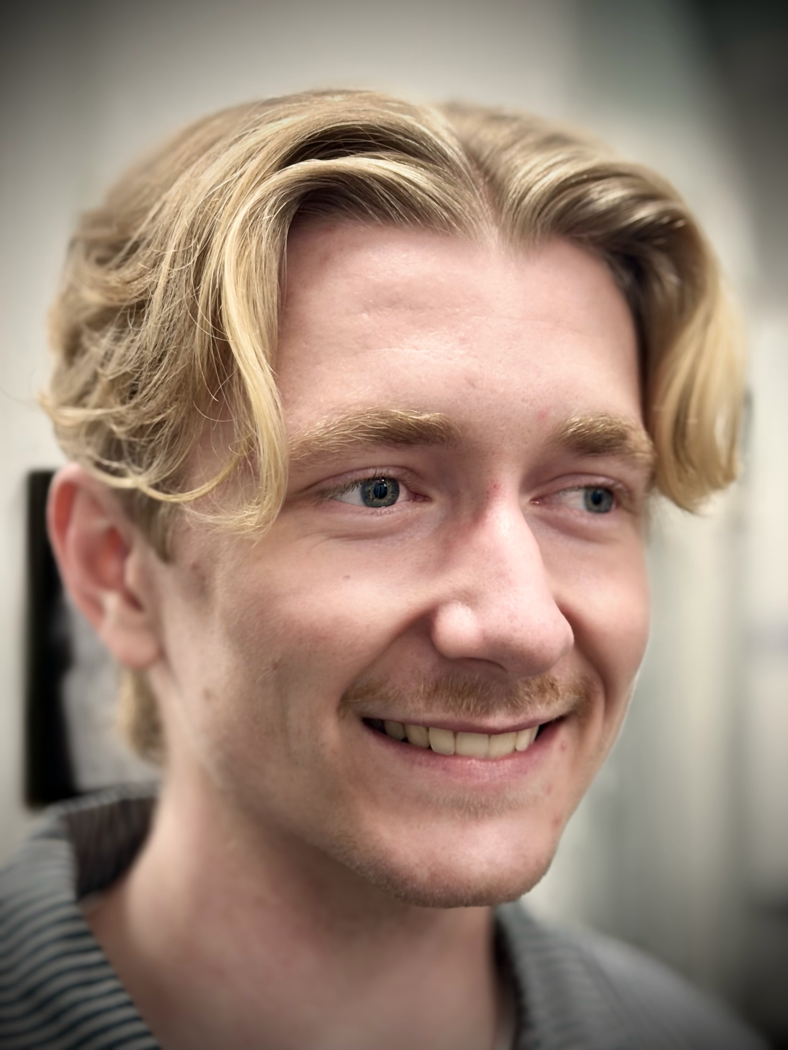 Blonde wolf cut men's hairstyle